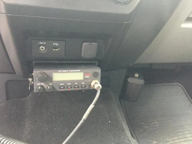 2015 Ford F-150. Tad M10 in the dash accessory pocket.